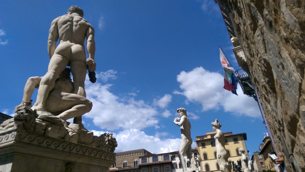 Entrance to the Palazzo Vecchio in Florence. In the middle there is replica of David sculpture.